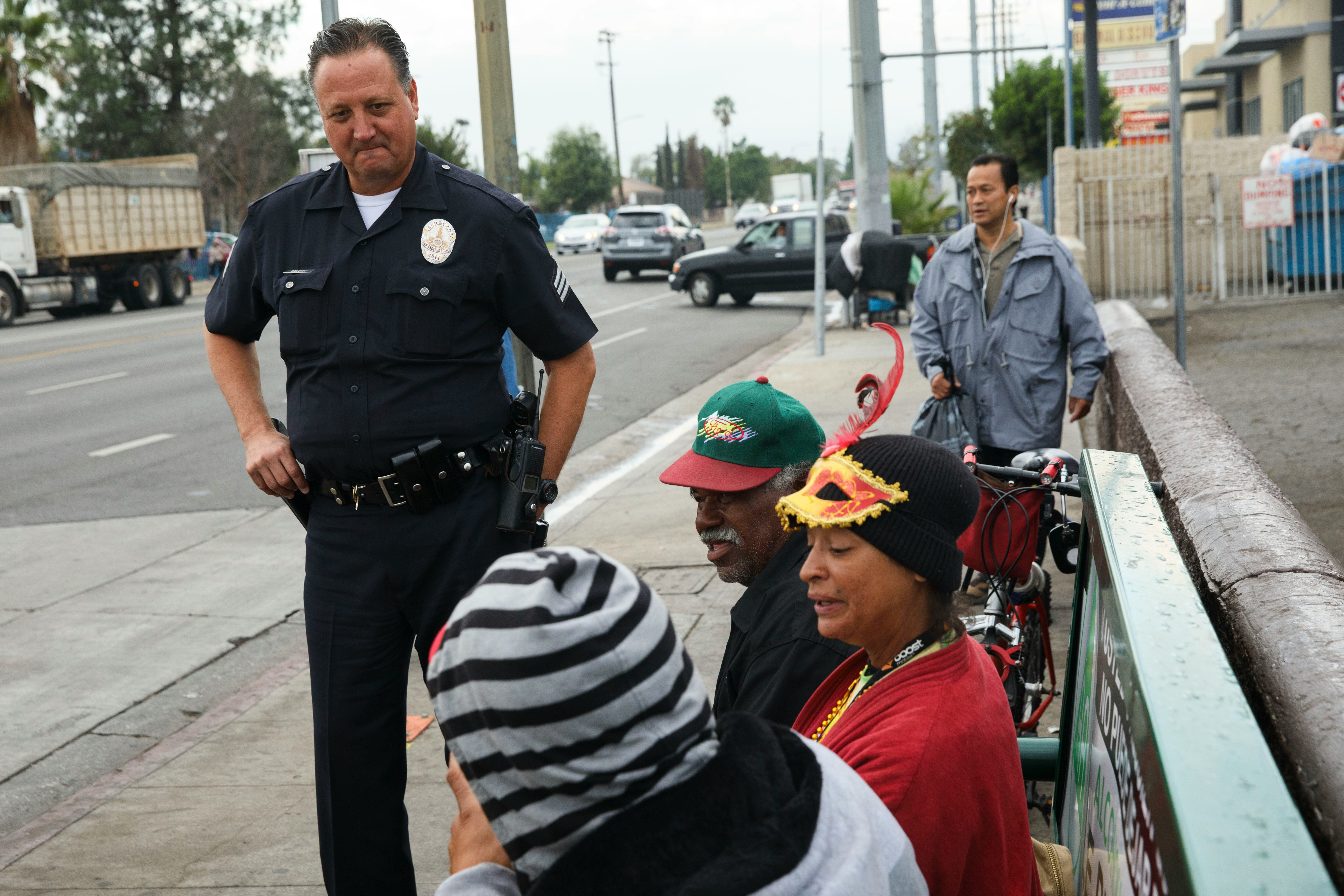 Los Angeles, CA - October 24: Sgt. Charles Coleman of the LAPD Foothill Division speaks with Claranc...