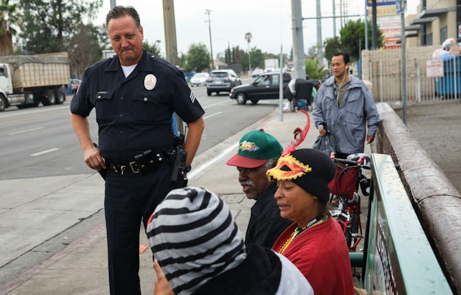 Los Angeles, CA - October 24: Sgt. Charles Coleman of the LAPD Foothill Division speaks with Claranc...