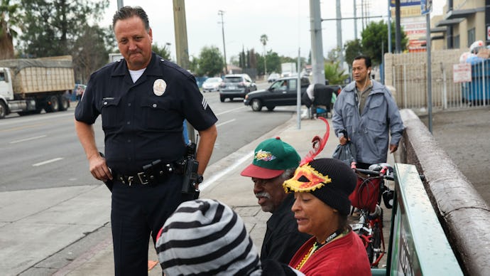 Los Angeles, CA - October 24: Sgt. Charles Coleman of the LAPD Foothill Division speaks with Claranc...