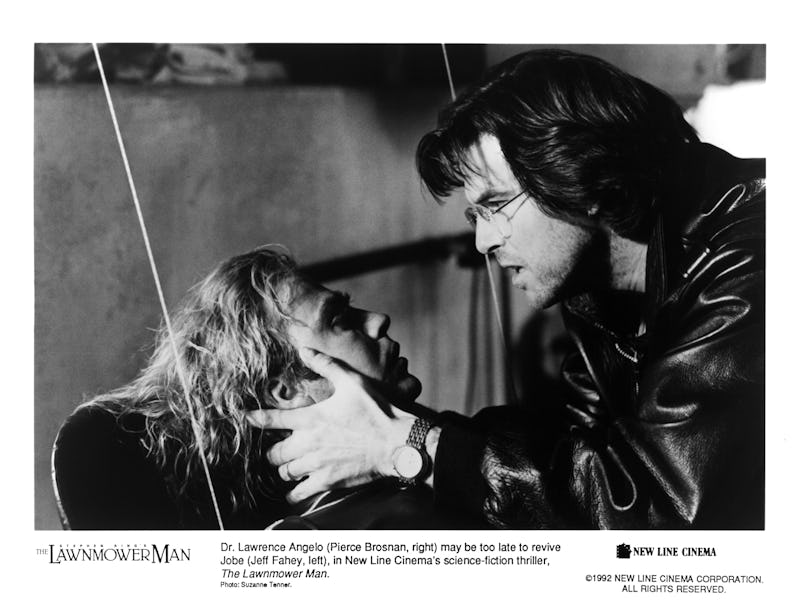 CIRCA 1992: Actors Pierce Brosnan and Matt Frewer in a scene from the New Line Cinema movie "Lawnmow...