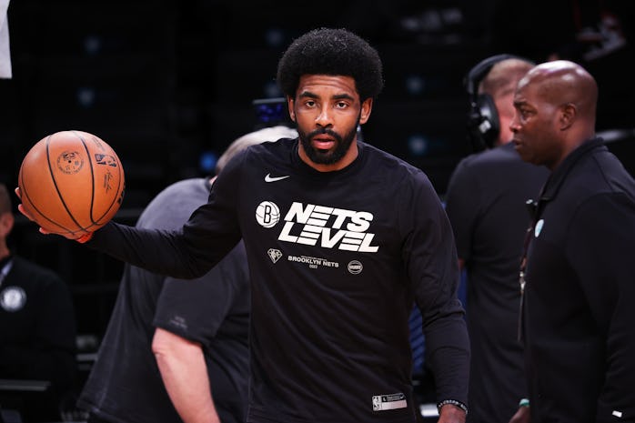 NEW YORK, NY - APRIL 25: Kyrie Irving of Brooklyn Nets warms up before NBA playoffs between Brooklyn...