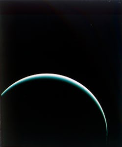 Uranus from Voyager 2, 25 January 1986. Farewell shot of crescent Uranus, taken from 600,000 miles (...