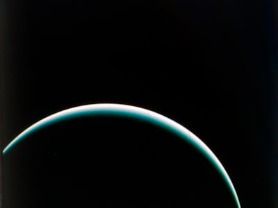 Uranus from Voyager 2, 25 January 1986. Farewell shot of crescent Uranus, taken from 600,000 miles (...