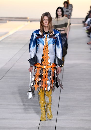 Models walk the runway for Louis Vuitton's Cruise 2023 Fashion Show at the Salk Institute in San Die...