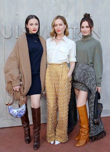 Iris Apatow, left and Leslie Mann arrive at the Chanel Cruise 2022