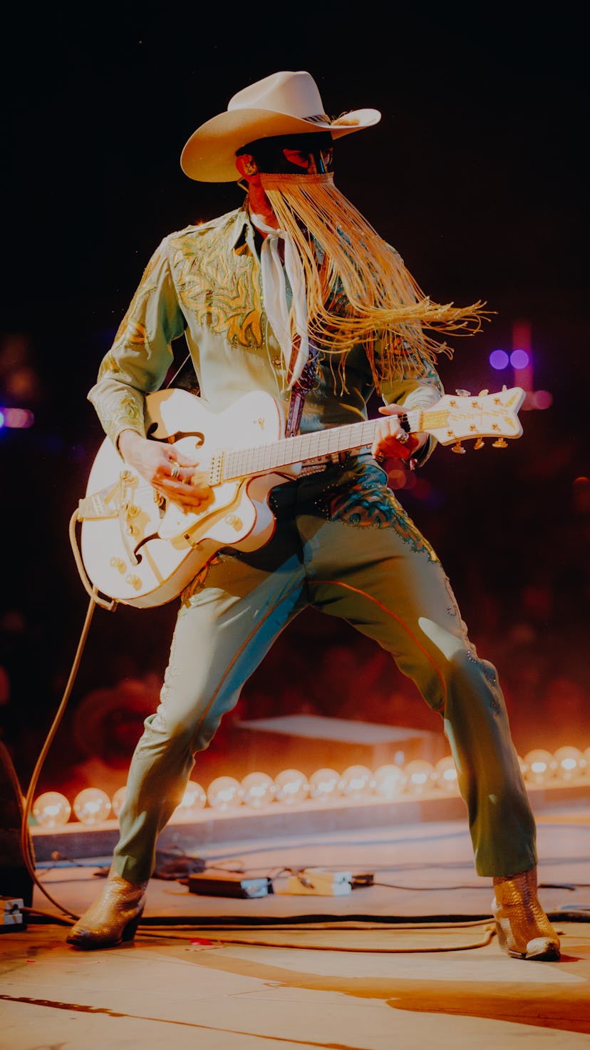 INDIO, CALIFORNIA - APRIL 30: Orville Peck performs onstage during Day 2 of the 2022 Stagecoach Fest...