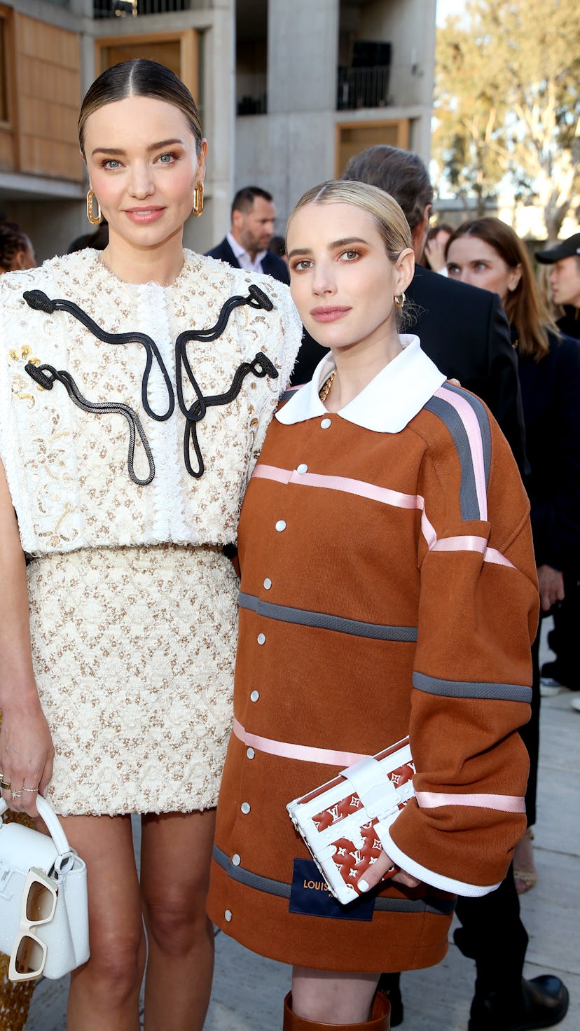 SAN DIEGO, CALIFORNIA - MAY 12: (L-R) Miranda Kerr and Emma Roberts attend the Louis Vuitton's 2023 ...