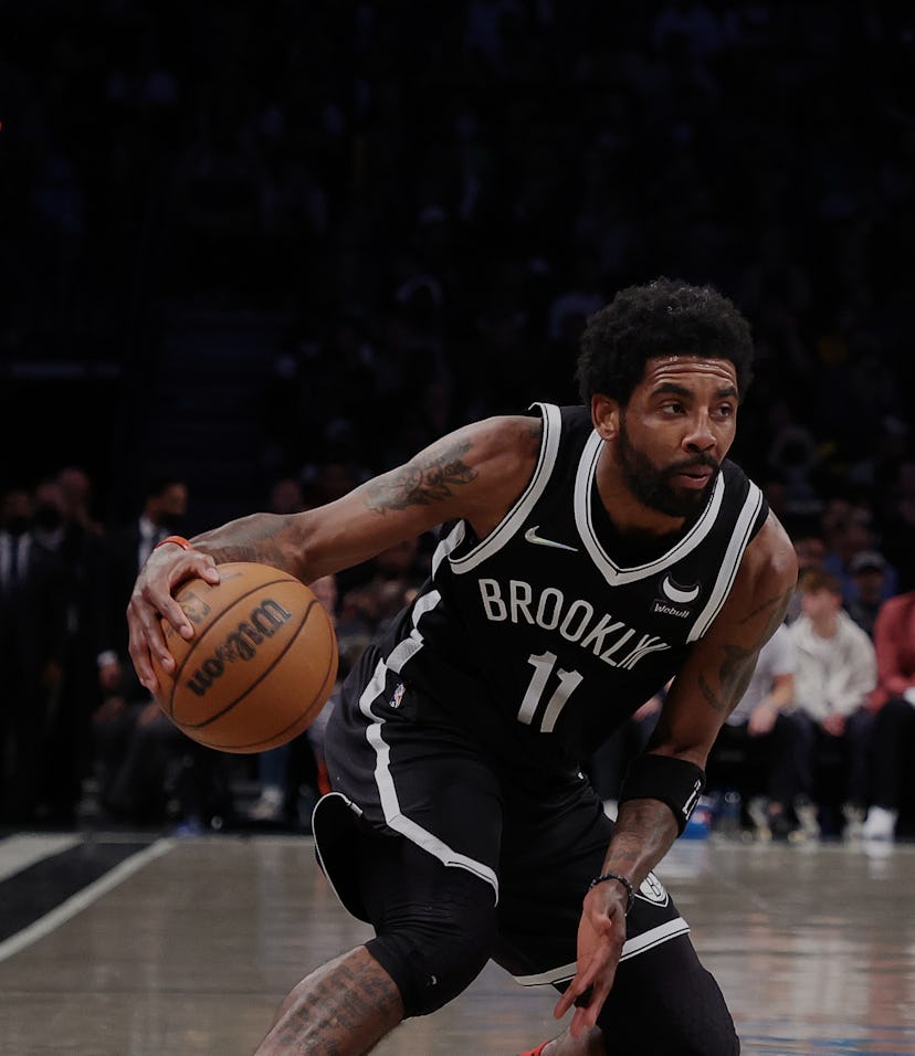NEW YORK, NEW YORK - APRIL 23:  Kyrie Irving #11 of the Brooklyn Nets dribbles against the Boston Ce...