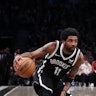 NEW YORK, NEW YORK - APRIL 23:  Kyrie Irving #11 of the Brooklyn Nets dribbles against the Boston Ce...
