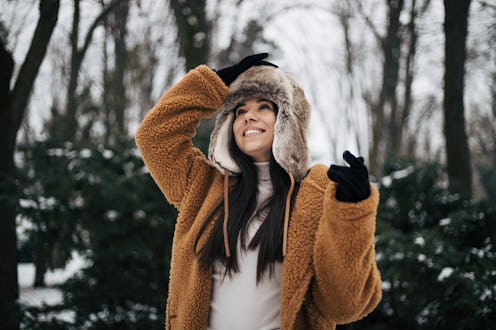 Girl enjoys the winter magic.