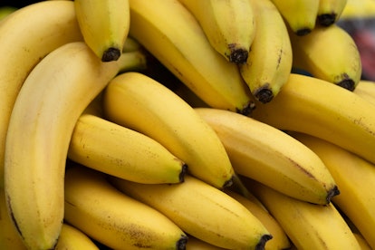 Ripe yellow bananas at the shopping market. Fruits that are healthy. The concept of vegetarianism, v...