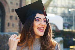 A woman in a graduation cap is outspoken. The four most outspoken zodiac signs, according to astrolo...