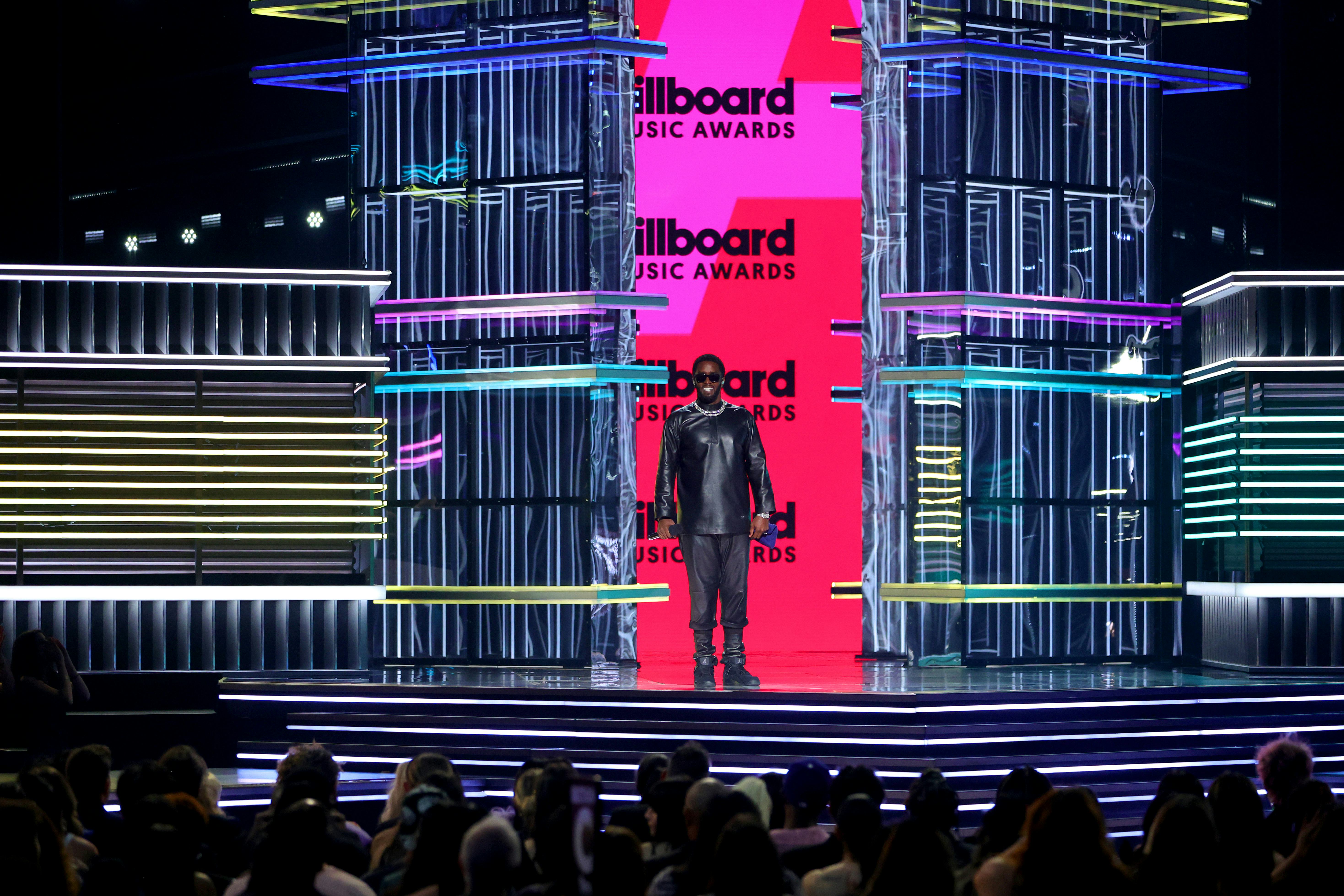 Host Sean "Diddy" Combs speaks onstage at the 2022 Billboard Music Awards