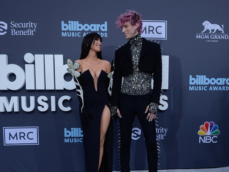 Megan Fox and Machine Gun Kelly attend the 2022 Billboard Music Awards with bangs and a $30,000 diam...