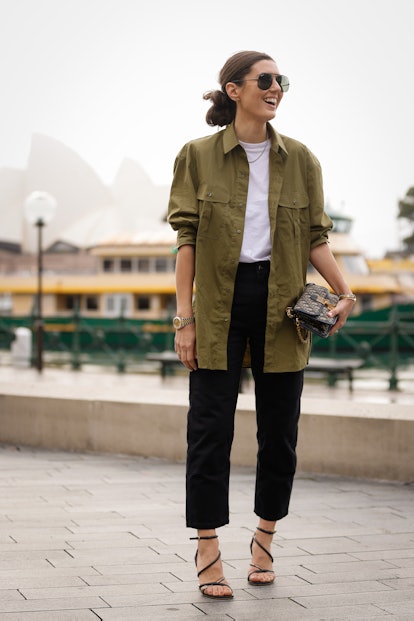 SYDNEY, AUSTRALIA - MAY 11: Jessica Pecoraro wearing khaki shirt, black pants, Fendi shoes and Dior ...