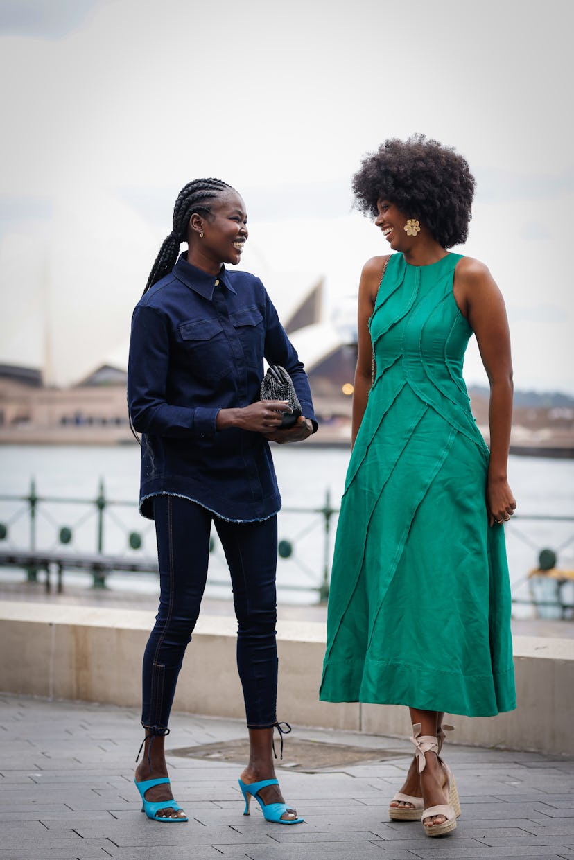 SYDNEY, AUSTRALIA - MAY 11: Aiyana Alexander wearing Aje Green long dress, Hanan Ibrahim wearing Bou...