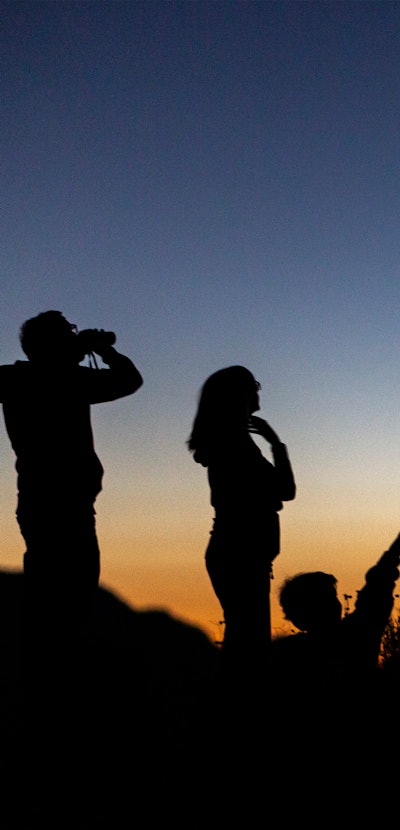 LOS ANGELES, CA - JULY 19:  People watch for the appearance of Comet NEOWISE over the San Gabriel Mo...