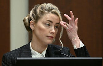 US actress Amber Heard testifies in the courtroom at the Fairfax County Circuit Courthouse in Fairfa...