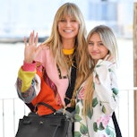 Heidi Klum's daughter Leni Klum recycled one of her classic looks. Here, the pair is seen in 2021 in...
