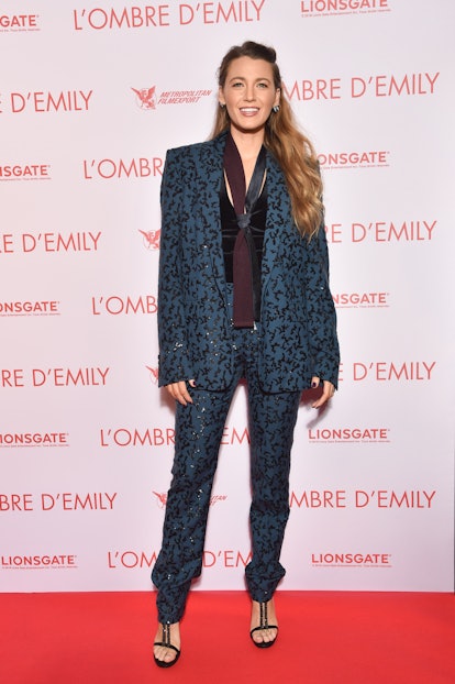 Blake Lively wearing a teal blue suit and t-strap pumps at the premiere of a simple favor in 2018