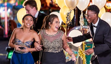 A group of friends use instagram captions for prom for pictures at their school dance.