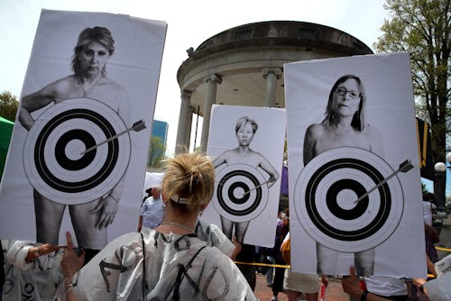 Boston, MA - May 14: Women carry self-portraits during Bans Off Our Bodies, a pro-choice rally on Bo...
