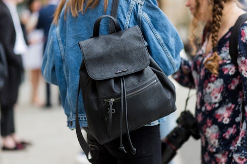 PARIS, FRANCE - JULY 03: A model wearing Calvin Klein backpack outside Schiaparelli during Paris Fas...