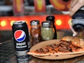 Here’s what the Pepsi-flavored pizza tastes like.