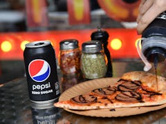 Here’s what the Pepsi-flavored pizza tastes like.
