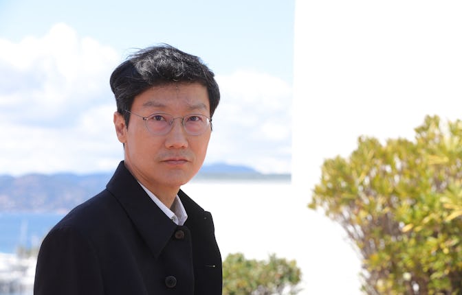 South Korean director Hwang Dong-Hyuk poses during the 'Squid Game' photocall as part of the 5th edi...