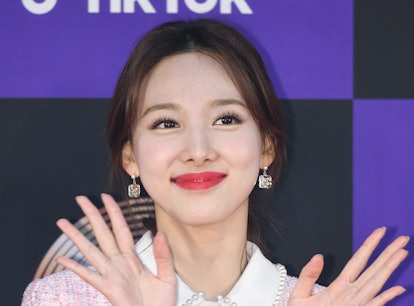 On May 18, TWICE's Nayeon announced she'll be releasing her first solo mini-album, 'IM NAYEON,' this...