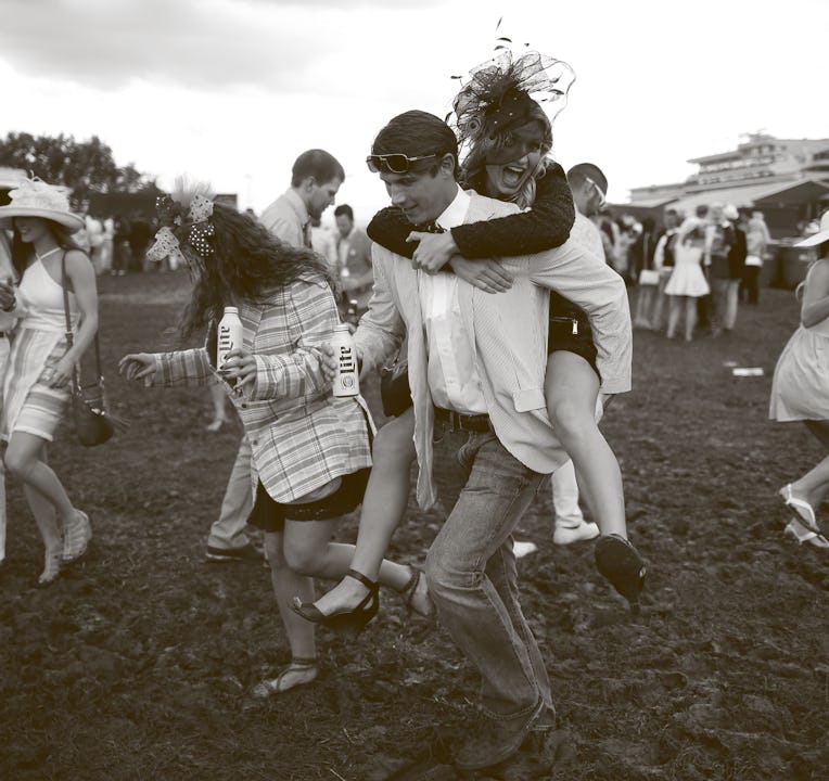 LOUISVILLE, KY - MAY 06:  Fans make their way through the infield prior to the 143rd running of the ...