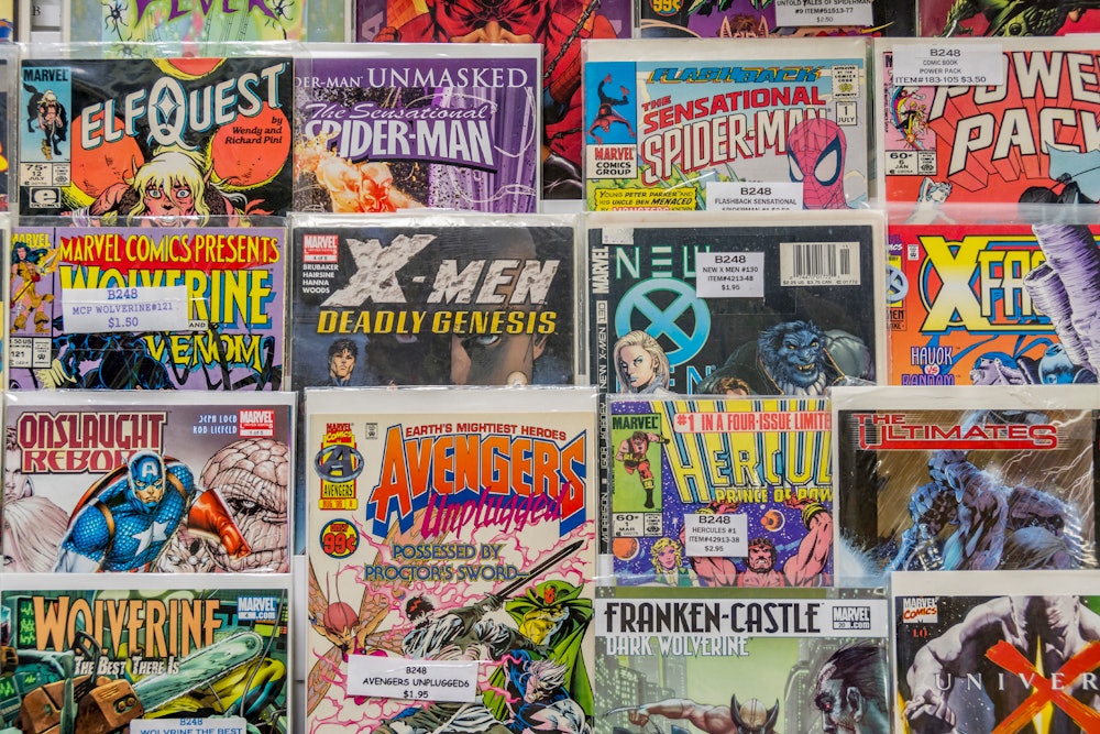 Rack of comic books for sale at a flea market. (Photo by: Education Images/Universal Images Group vi...