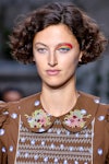  A model wearing rainbow eyeshadow walks the runway during the Paul and Jo Ready to Wear Spring Summ...