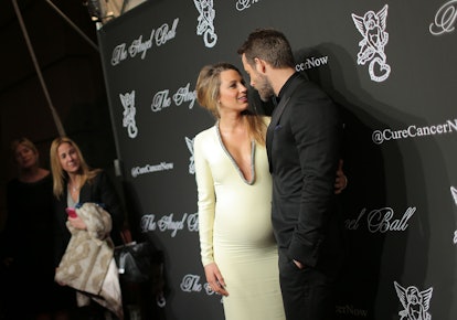 Blake Lively debuted her baby bump at the 2014 Angel Ball.