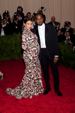 Kanye West and Kim Kardashian attend the 2013 Met Gala at the Metropolitan Museum of Art in New York...