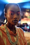 A model wearing rainbow eyeshadow backstage ahead of the OSMAN  show during London Fashion Week Sept...