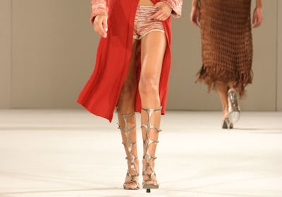 Model wearing gladiator sandals in Miami 