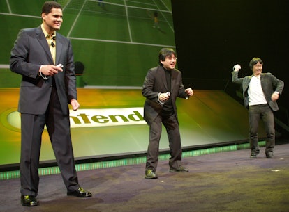 Reggie Fils-Aime, Executive Vice President of Sales and Marketing for Nintendo of America, Satoru Iw...