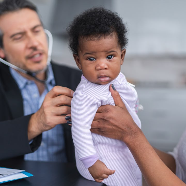 A new mother takes her newborn baby to visit the doctor for a check up. The American Association of ...
