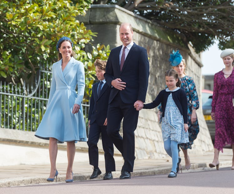 Prince William, Kate Middleton, and their children Prince George and Princess Charlotte attend the E...