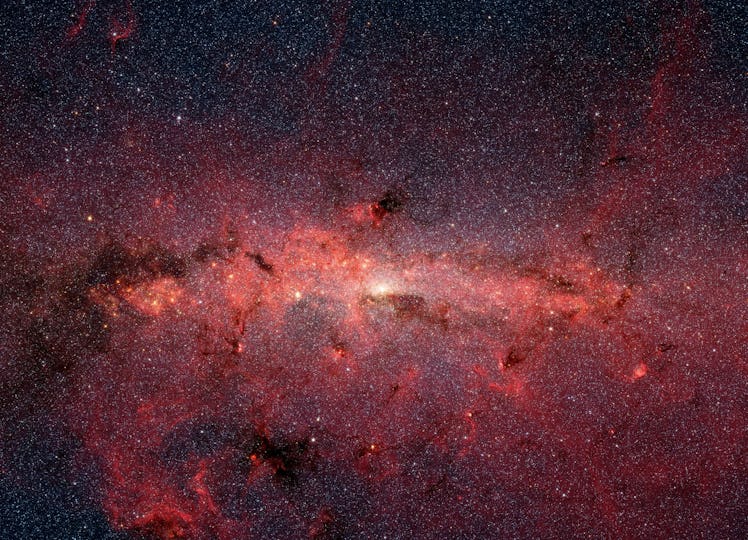 Photograph of the Milky Way Galaxy captured by NASA's Spitzer Space Telescope. Dated 2007. (Photo by...