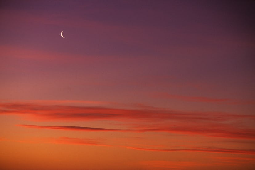 NEW ZEALAND - 1995/01/01: New Zealand, South Pacific Ocean, Off Dunedin, Sunset With New Moon. (Phot...
