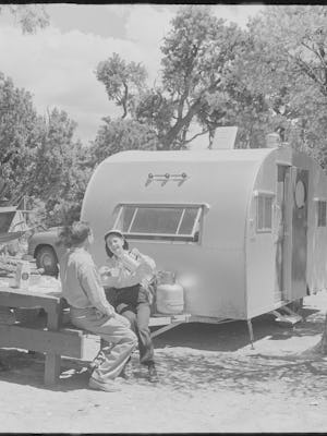 A family camps at Desert View Camp Grounds, in Grand Canyon National Park, with their family trailer...
