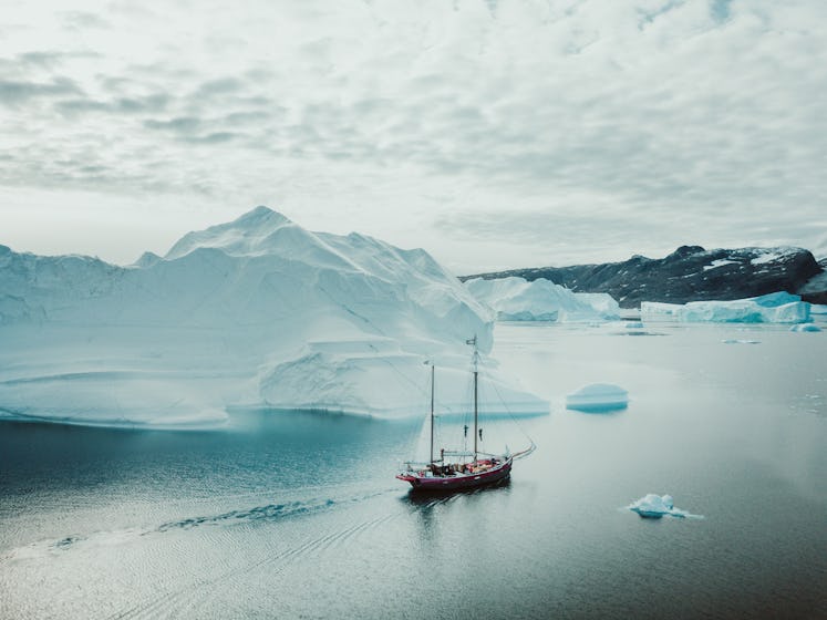 Photo from an expedition with a sailing boat through the beautiful vast landscape of huge icebergs a...