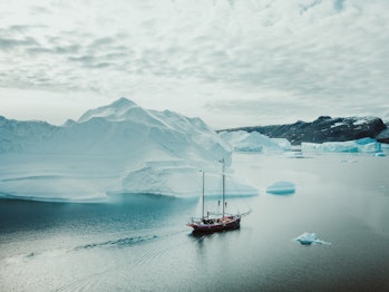Photo from an expedition with a sailing boat through the beautiful vast landscape of huge icebergs a...