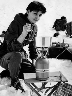 Winter camping. cooking with gas cylinder. 1957. (Photo by: Touring Club Italiano/Marka/Universal Im...