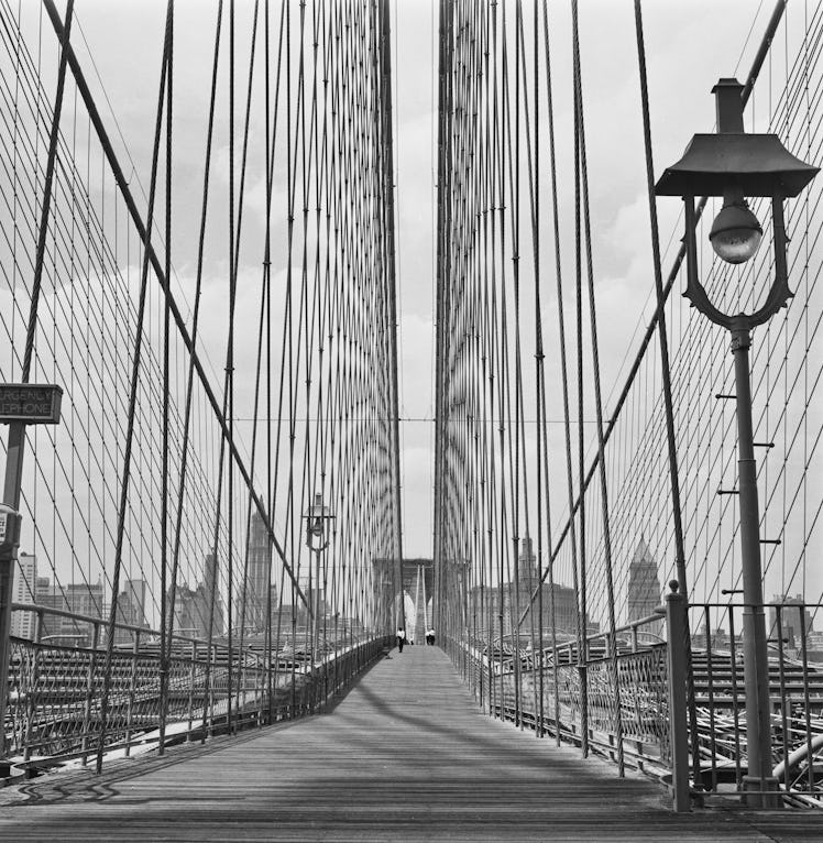 The pedestrian walkway on Brooklyn Bridge over the East River in New York City, USA, circa 1965.  (P...