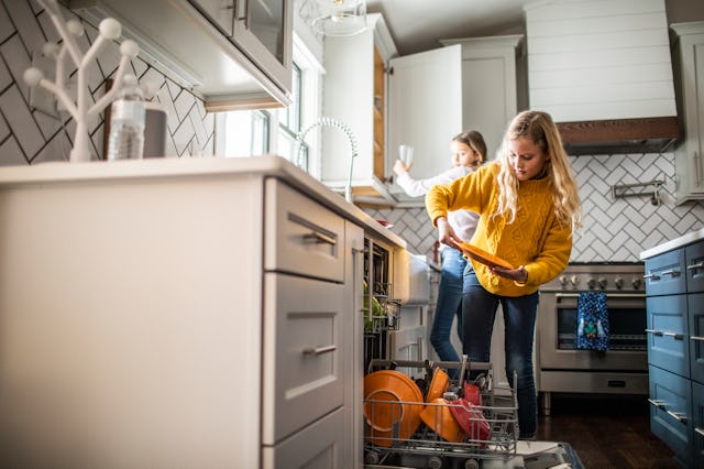 Washing and putting away the dishes is a common chore for tweens.