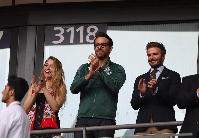 Wrexham Owner & Hollywood actor Ryan Reynolds (C), with wife Blake Lively (L) and ex England Footbal...